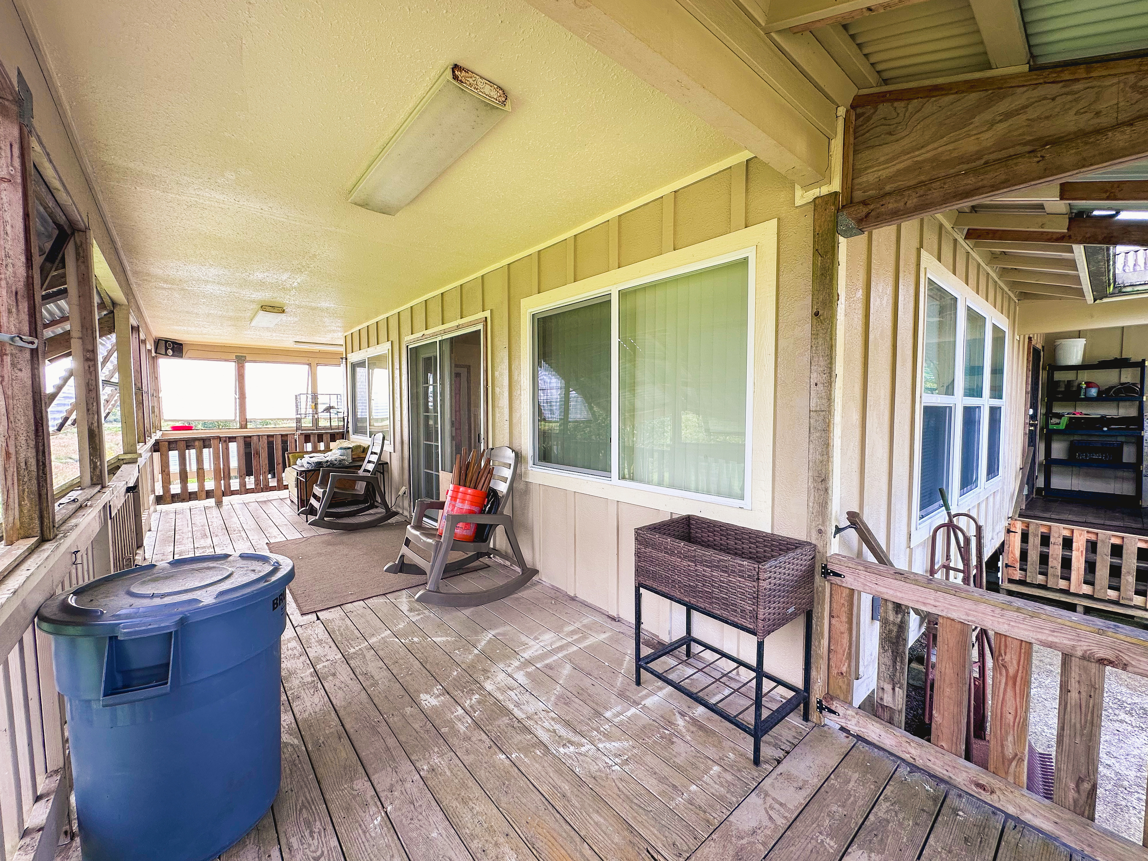 18-7747 North Kulani Road Mountain View, HI 96771 - Photo 12 of 28 a living room with furniture and a window
