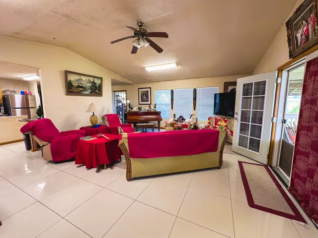 a bedroom with furniture and window