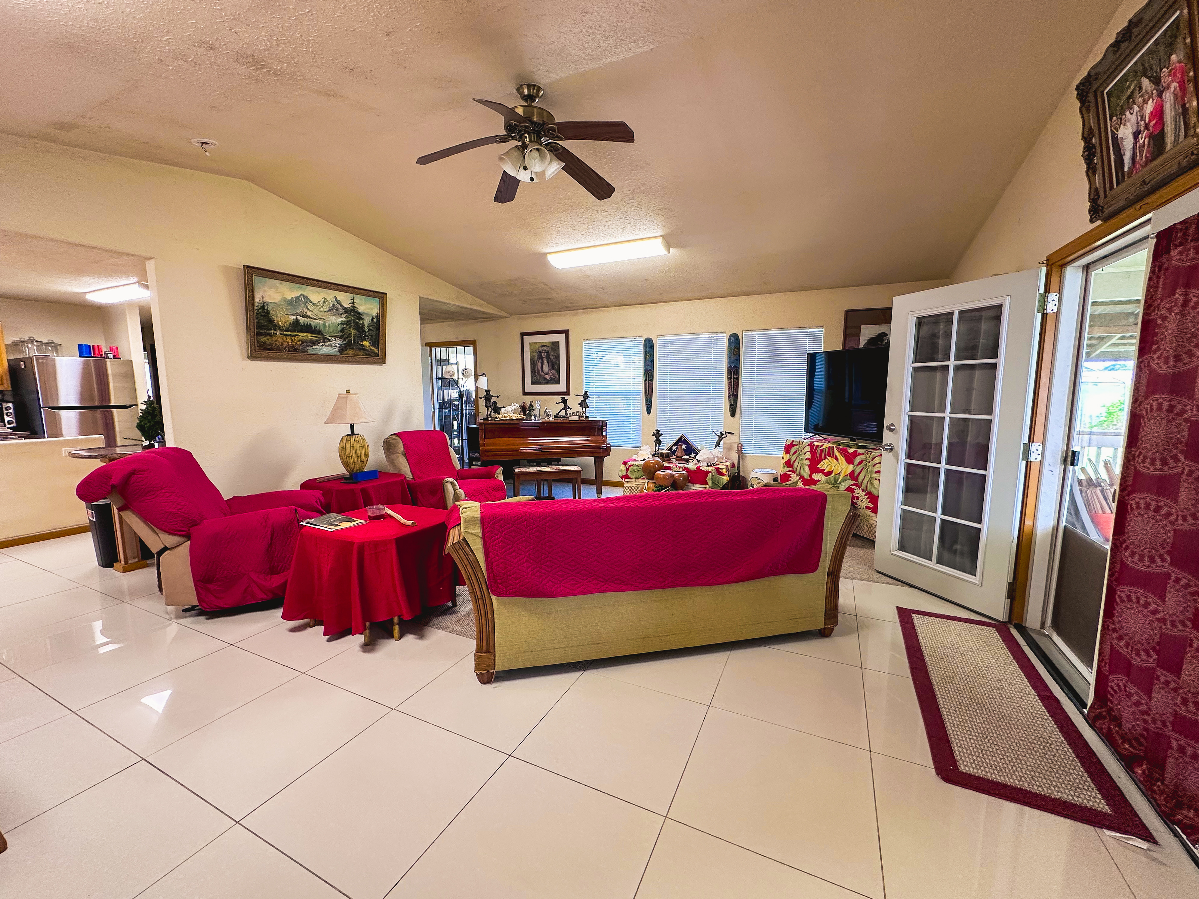 18-7747 North Kulani Road Mountain View, HI 96771 - Photo 16 of 28 a bedroom with furniture and window