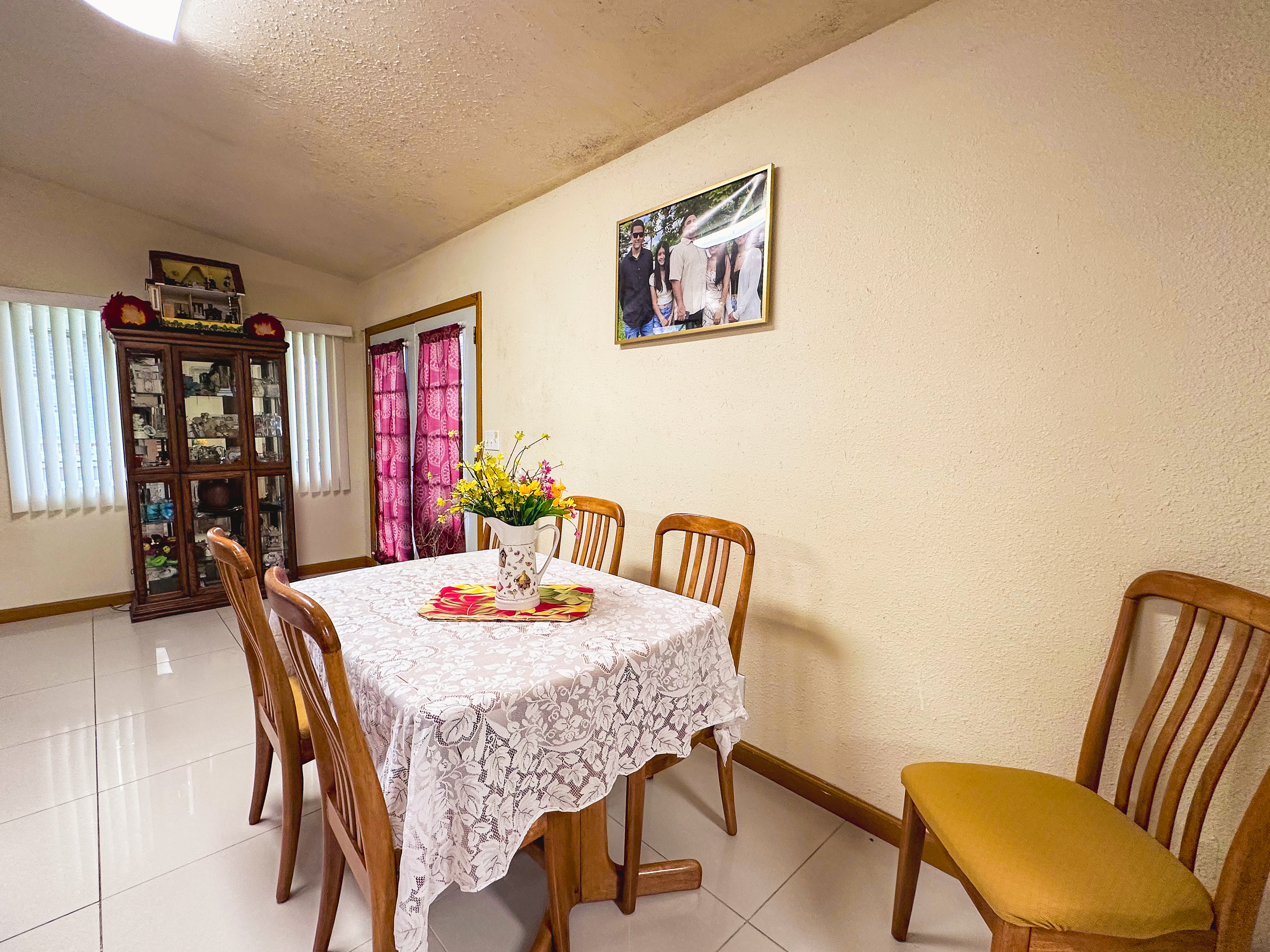 18-7747 North Kulani Road Mountain View, HI 96771 - Photo 17 of 28 a dining room with furniture and wooden floor