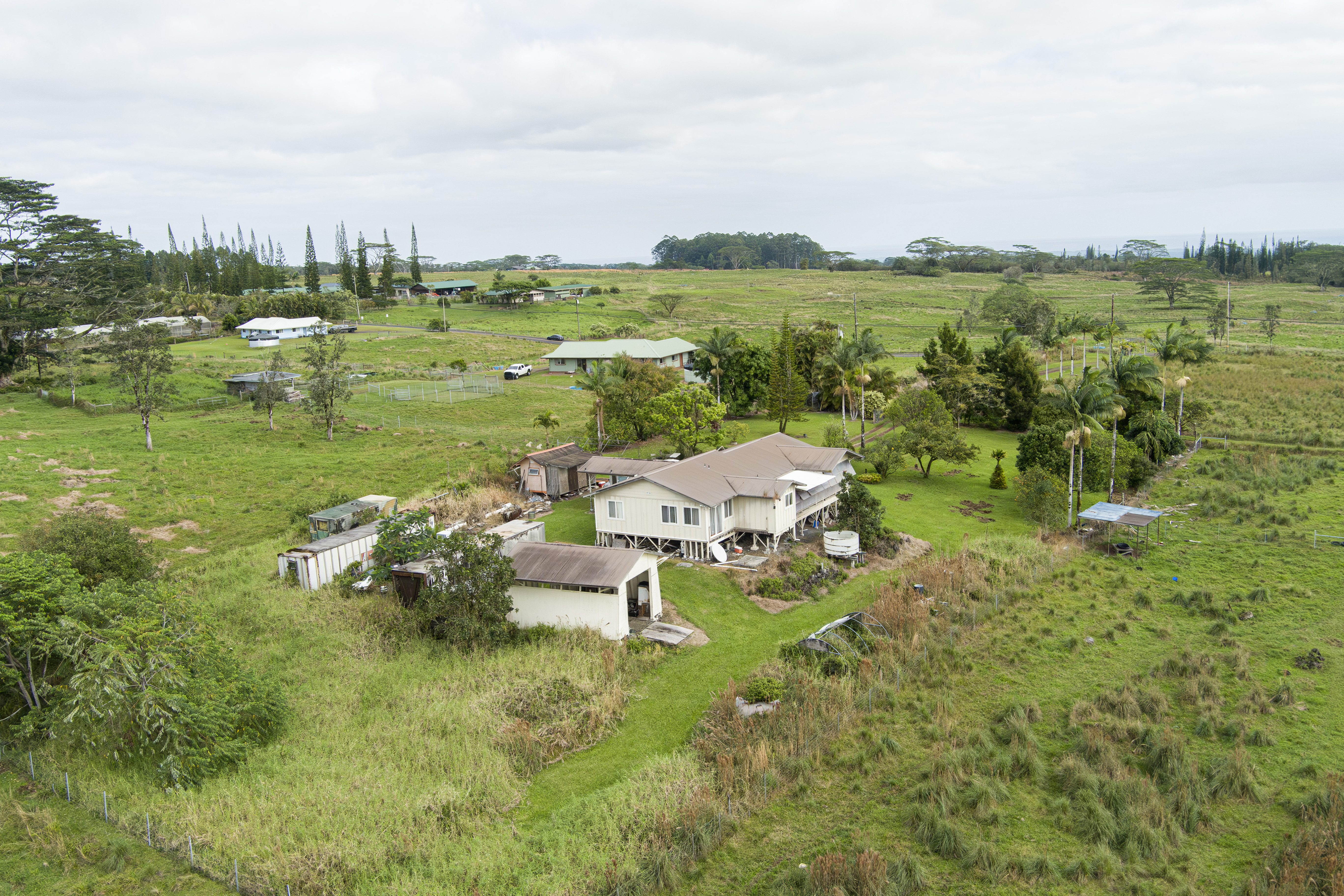18-7747 North Kulani Road Mountain View, HI 96771 - Photo 3 of 28 a garden with lake view