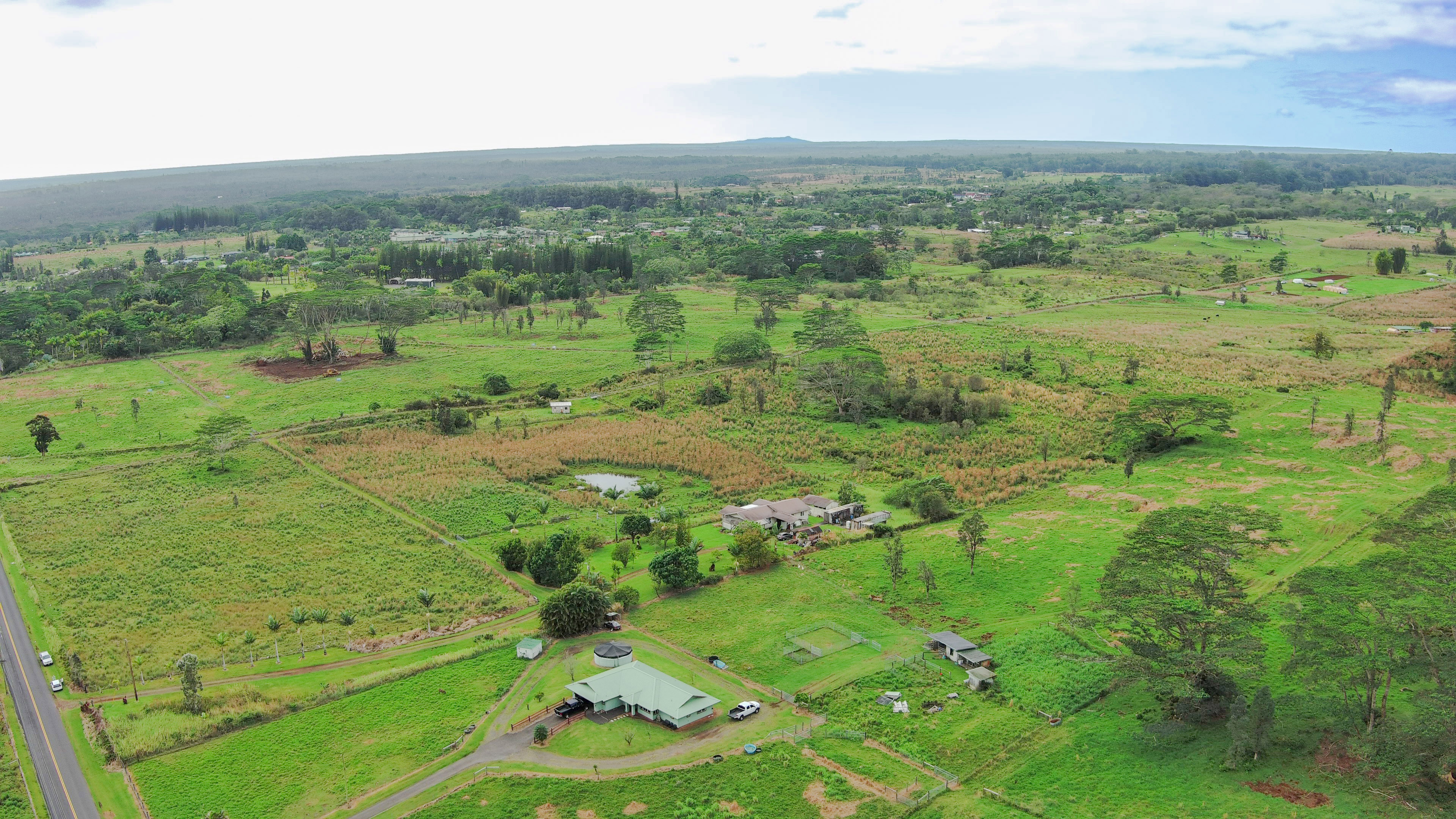 18-7747 North Kulani Road Mountain View, HI 96771 - Photo 5 of 28 a view of a green field with lots of green space