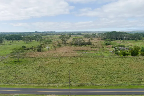 a view of a lake with green space