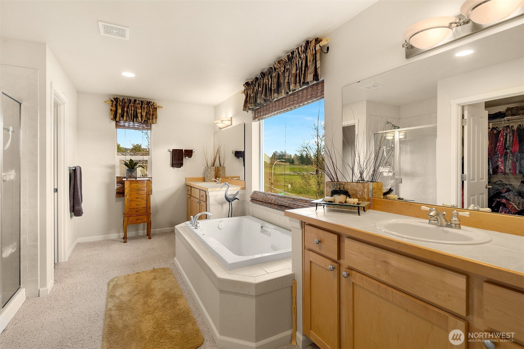 1306 68th Street Southeast Auburn, WA 98092 - Photo 18 of 39 a bathroom with a sink double vanity