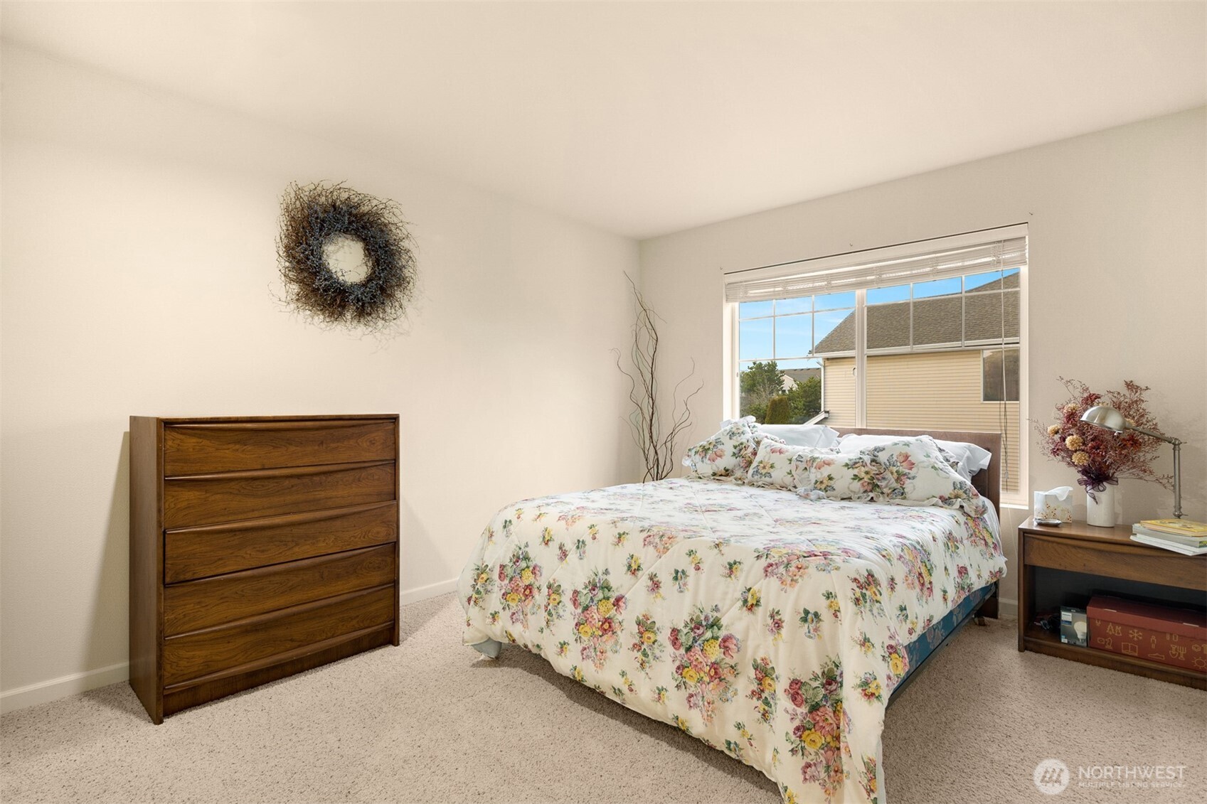 1306 68th Street Southeast Auburn, WA 98092 - Photo 19 of 39 a bedroom with a bed and a window