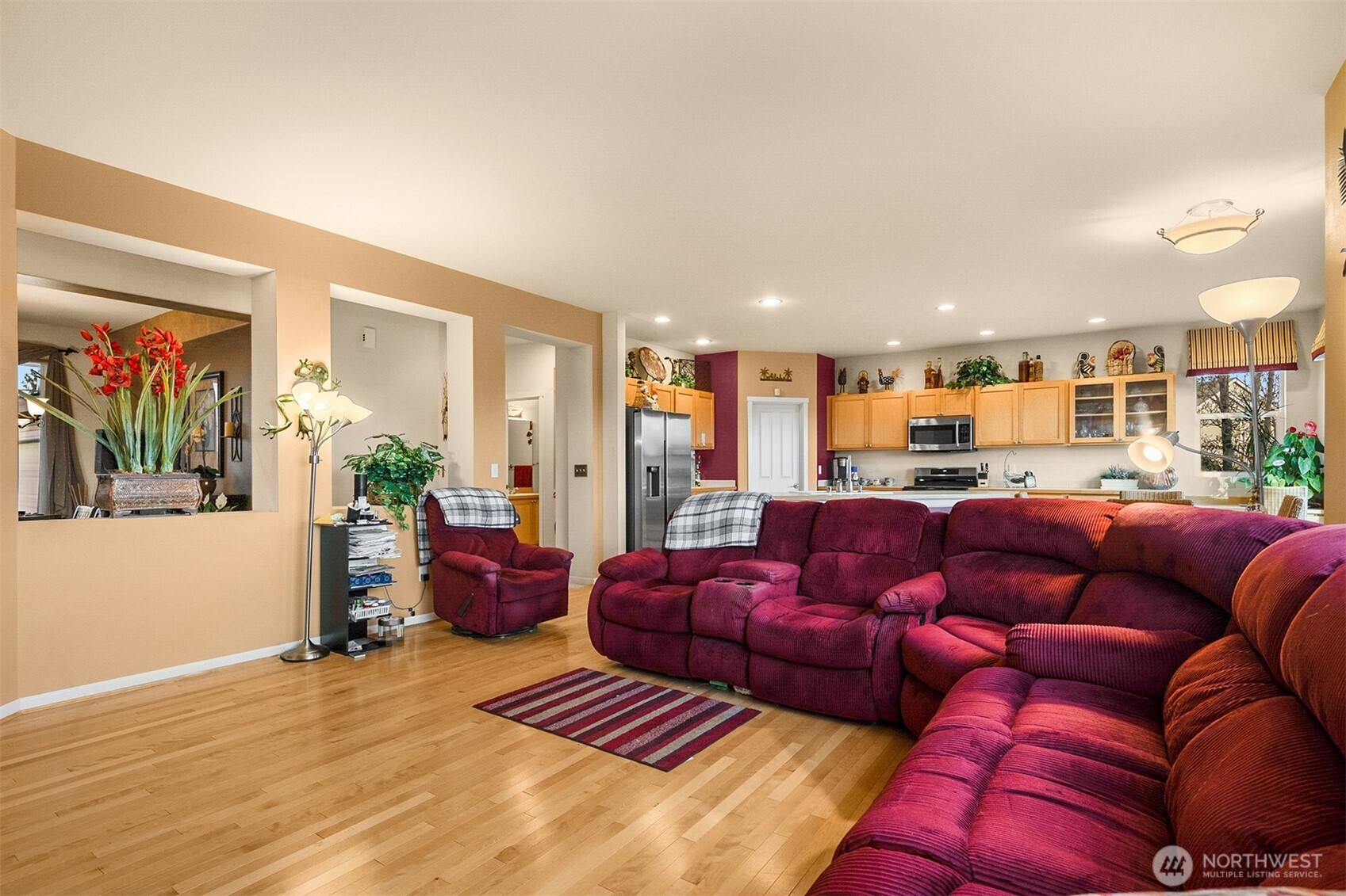 1306 68th Street Southeast Auburn, WA 98092 - Photo 25 of 39 a living room with furniture kitchen view and a window