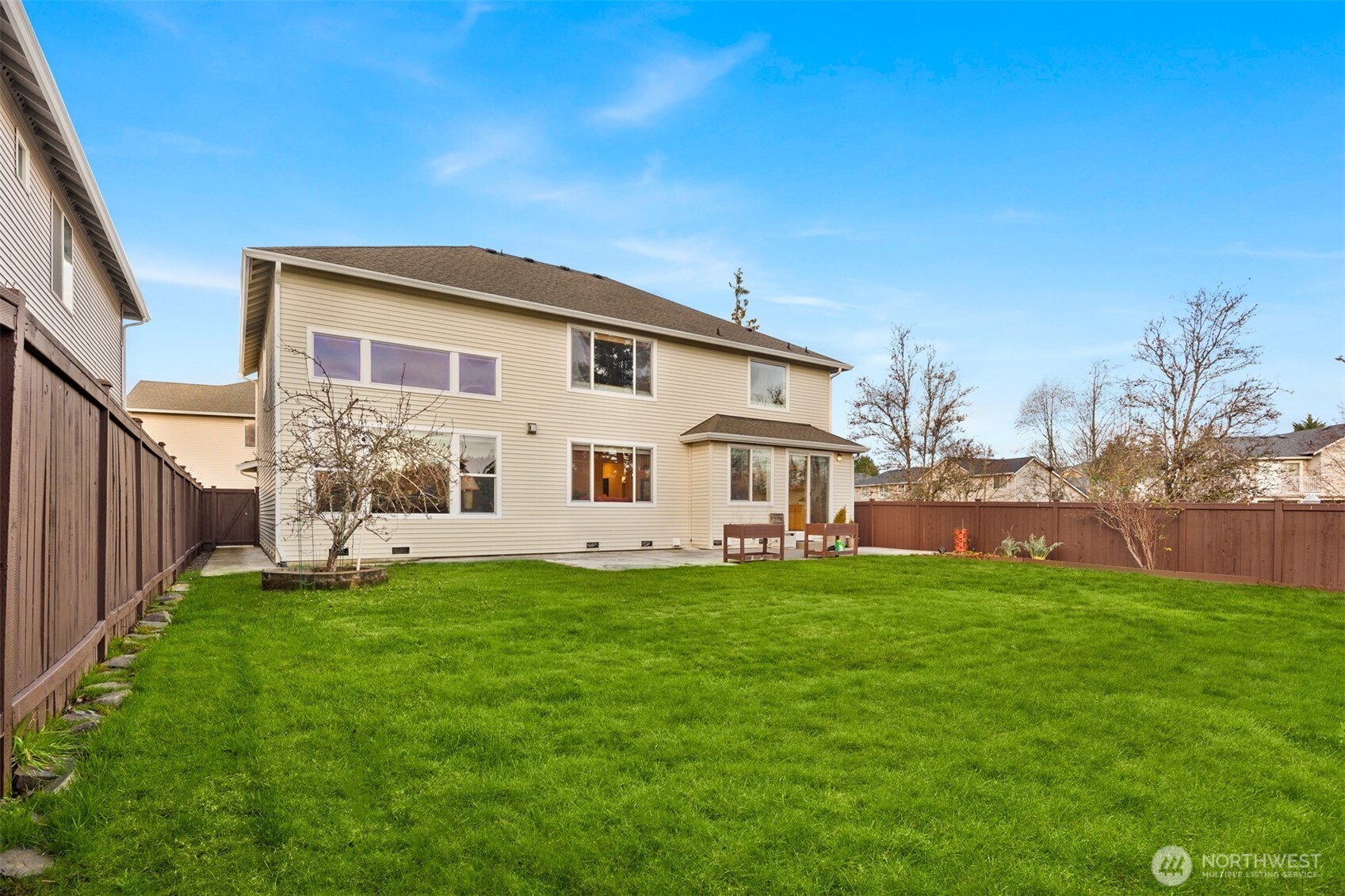 1306 68th Street Southeast Auburn, WA 98092 - Photo 32 of 39 a view of a house with a yard