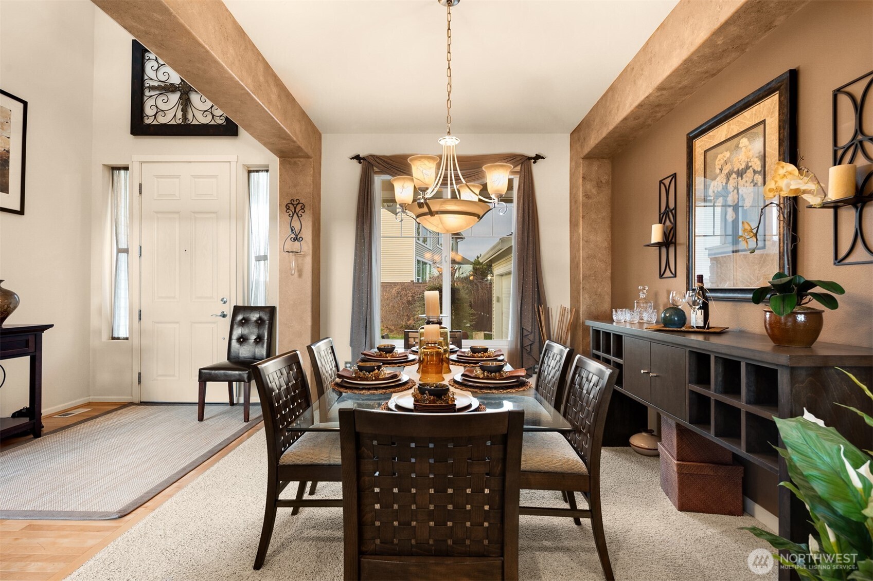 1306 68th Street Southeast Auburn, WA 98092 - Photo 6 of 39 a view of a dining room with furniture window and wooden floor