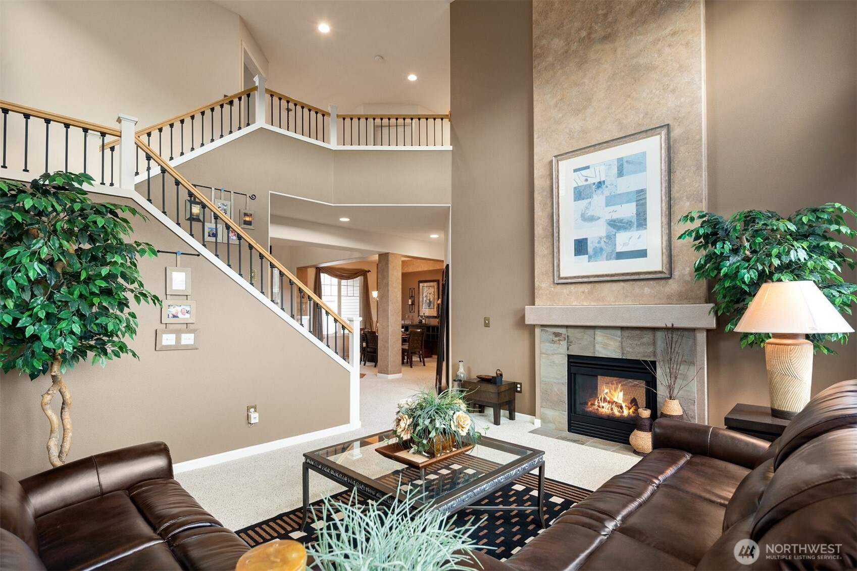 1306 68th Street Southeast Auburn, WA 98092 - Photo 9 of 39 a living room with furniture potted plant and a fireplace