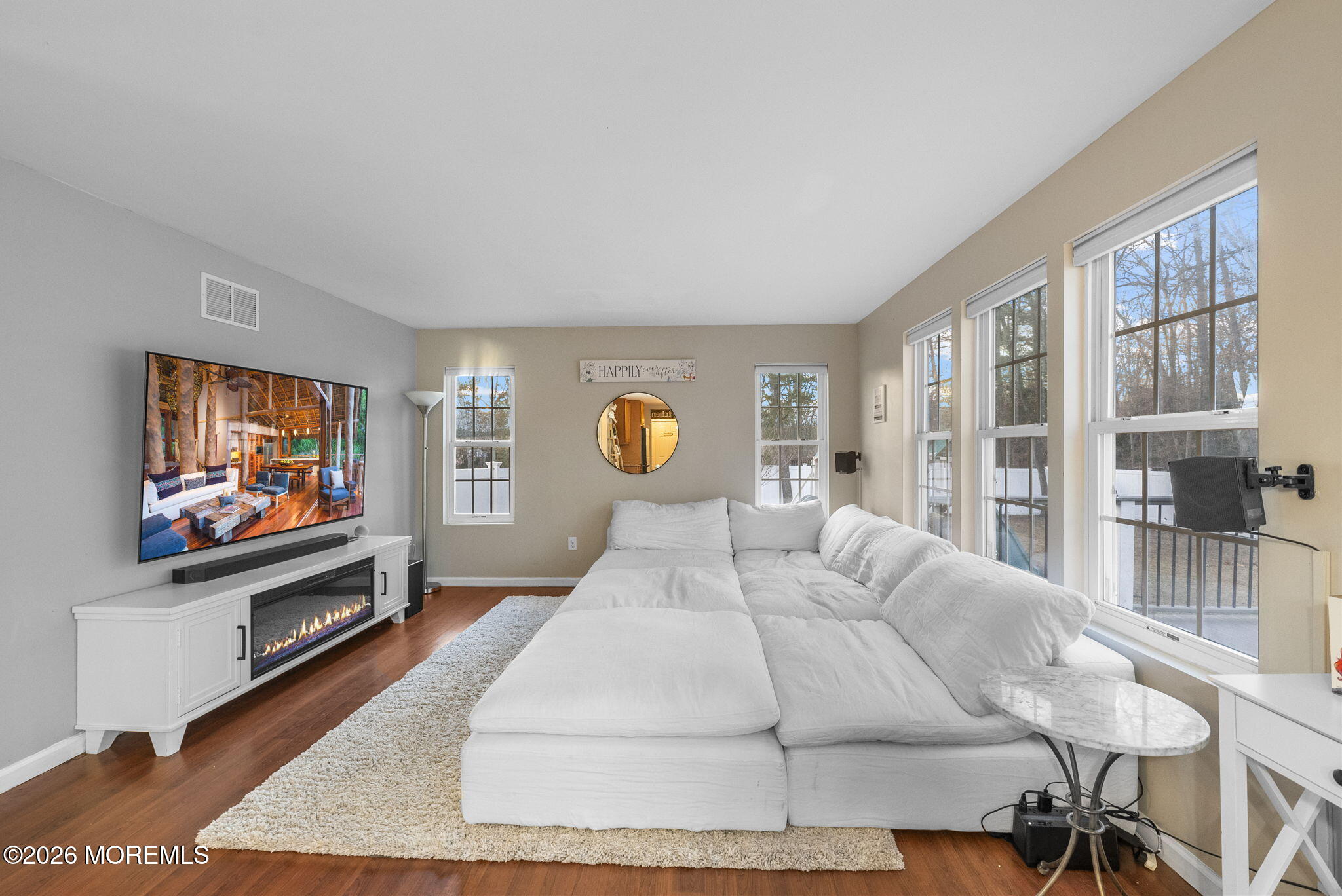 276 Andrews Road Jackson, NJ 08527 - Photo 19 of 46 a bedroom with a bed and a flat screen television