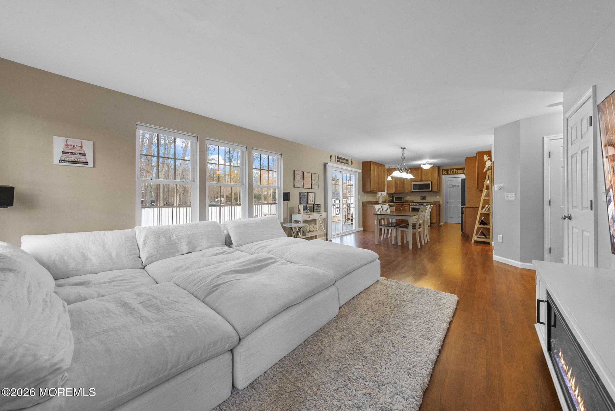 276 Andrews Road Jackson, NJ 08527 - Photo 20 of 46 a living room with furniture and a table