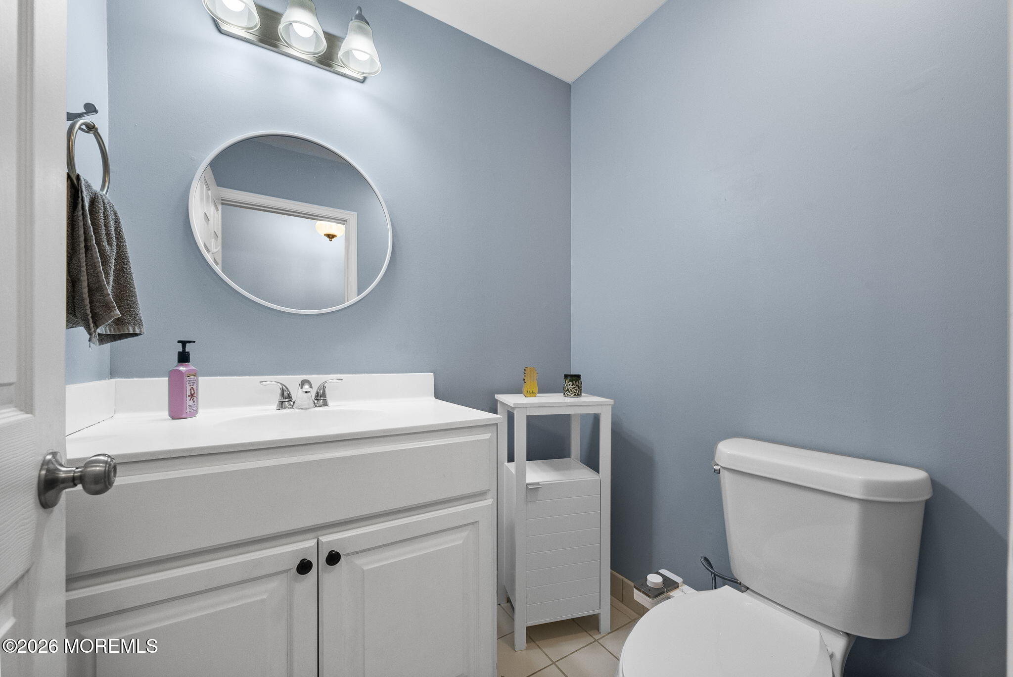 276 Andrews Road Jackson, NJ 08527 - Photo 21 of 46 a bathroom with a toilet sink and mirror