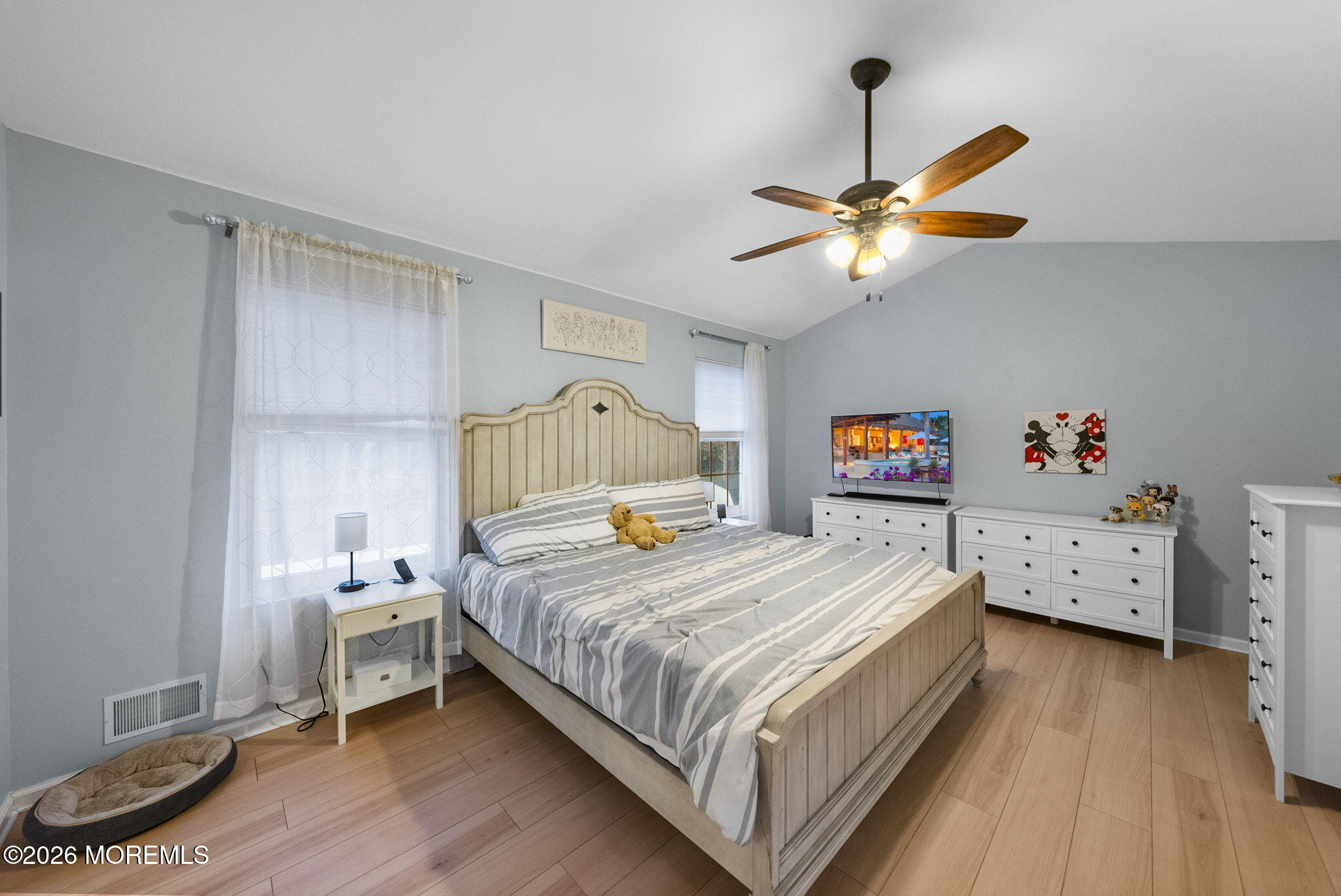 276 Andrews Road Jackson, NJ 08527 - Photo 24 of 46 a bedroom with a bed and a chandelier
