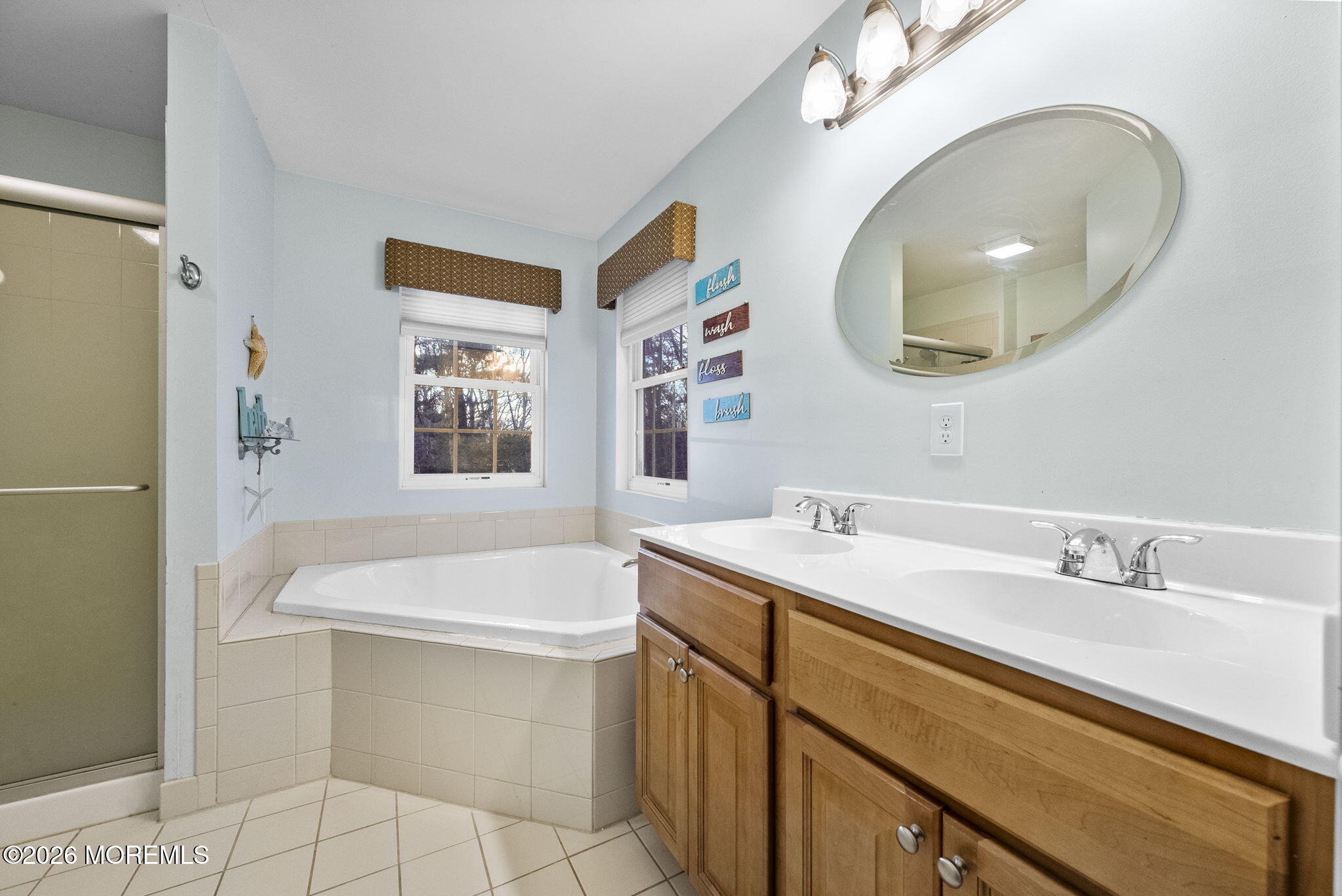 276 Andrews Road Jackson, NJ 08527 - Photo 26 of 46 a bathroom with a sink and a mirror