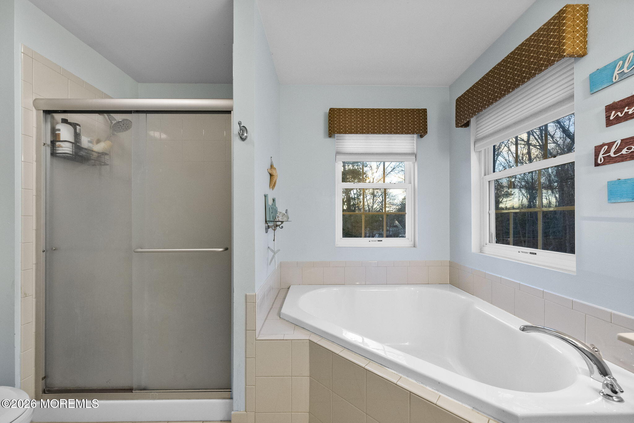 276 Andrews Road Jackson, NJ 08527 - Photo 27 of 46 a white bath tub sitting next to a shower