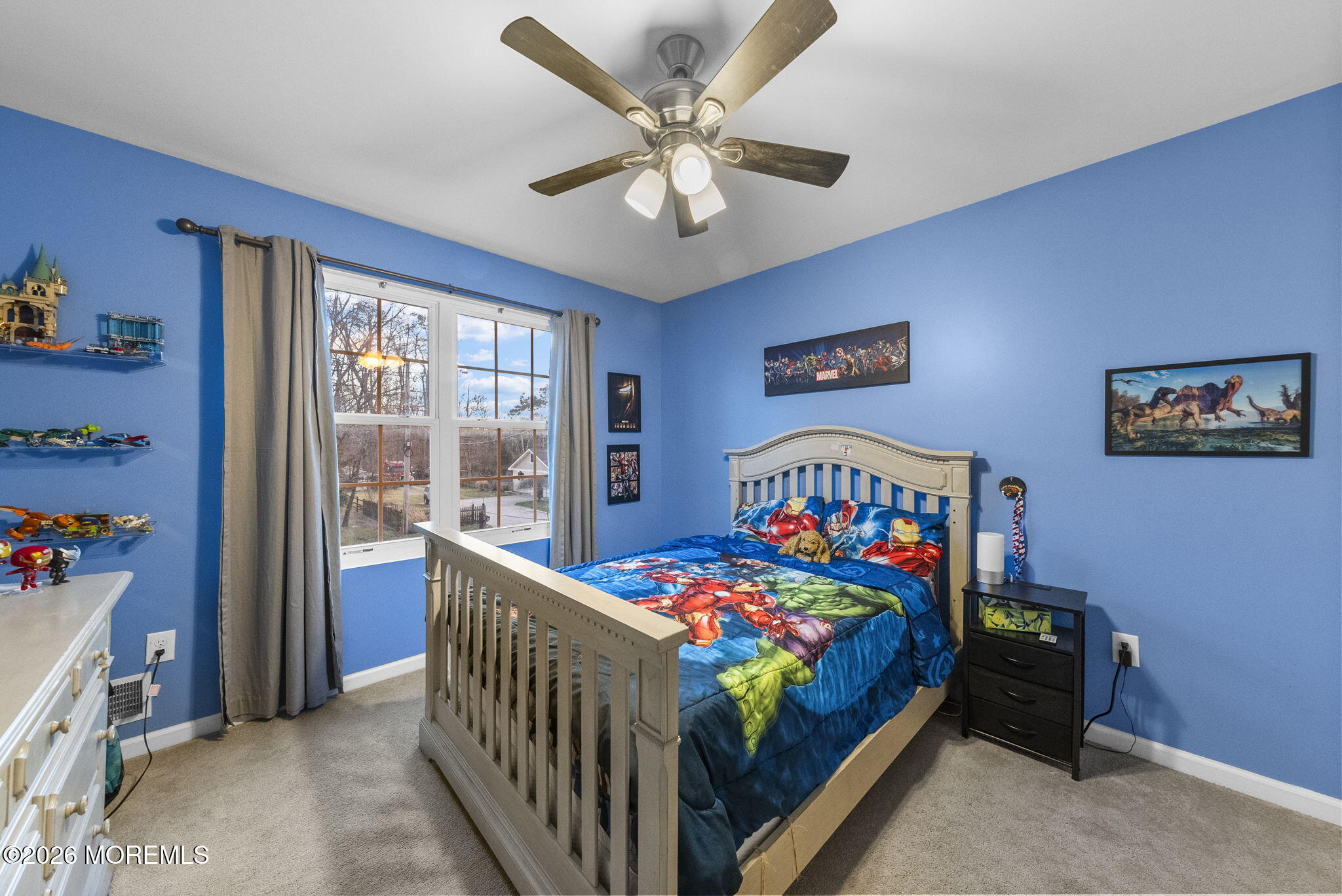 276 Andrews Road Jackson, NJ 08527 - Photo 29 of 46 a bedroom with furniture a baby crib and a chandelier fan