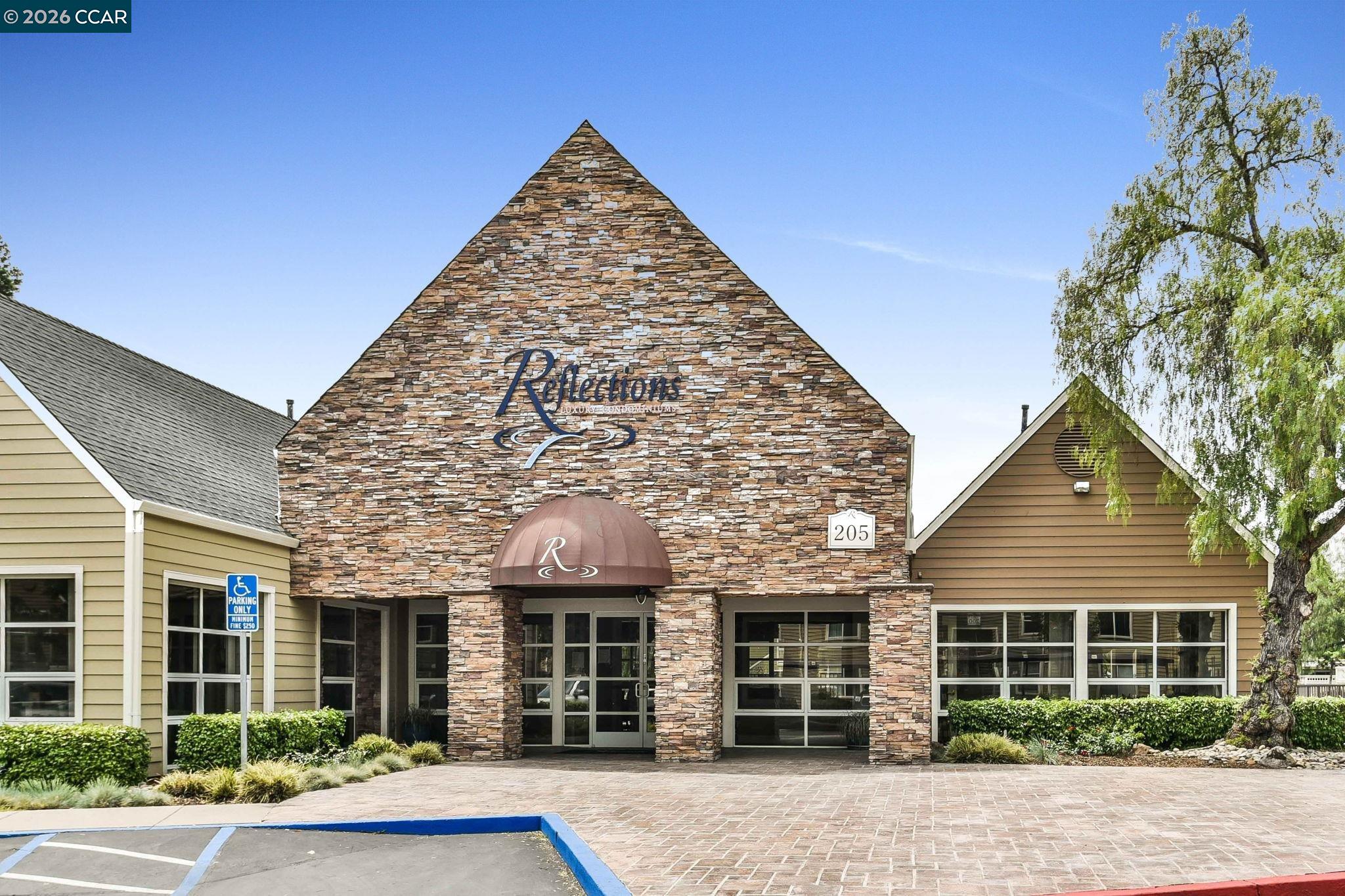 140 Reflections Drive, Unit 21 San Ramon, CA 94583 - Photo 21 of 34 front view of a house with a yard