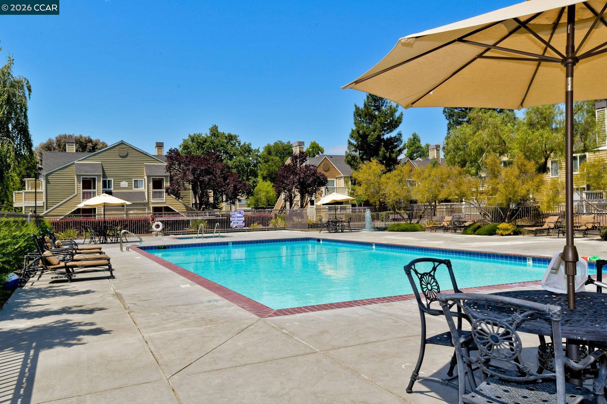 140 Reflections Drive, Unit 21 San Ramon, CA 94583 - Photo 24 of 34 a view of swimming pool with outdoor seating space