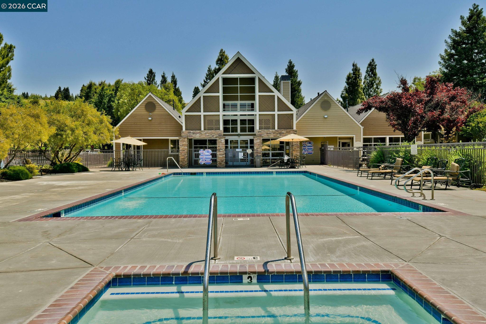 140 Reflections Drive, Unit 21 San Ramon, CA 94583 - Photo 25 of 34 a front view of house with yard and green space