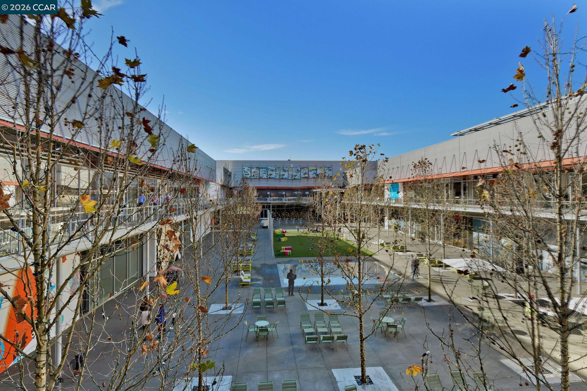 140 Reflections Drive, Unit 21 San Ramon, CA 94583 - Photo 32 of 34 a view of a chairs and table in a patio