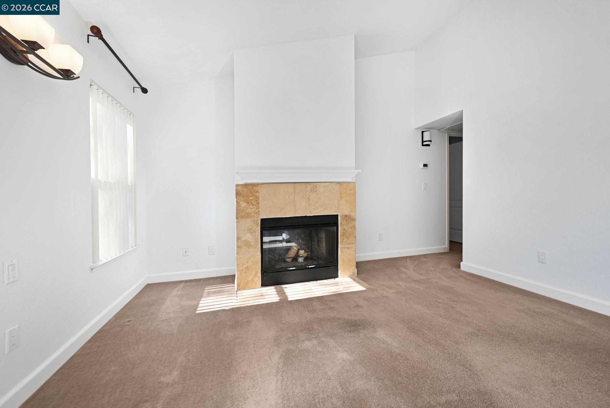 140 Reflections Drive, Unit 21 San Ramon, CA 94583 - Photo 5 of 34 a view of an empty room with a window