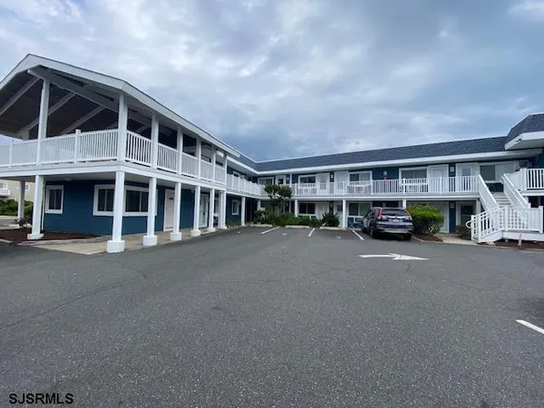a city view with tall buildings and a street