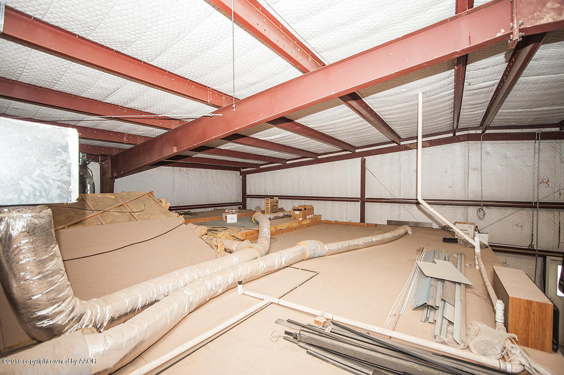 5220 West McCormick Road Amarillo, TX 79118 - Photo 12 of 25 garage attic storage