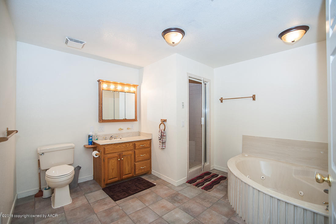 5220 West McCormick Road Amarillo, TX 79118 - Photo 17 of 25 master bedroom bath