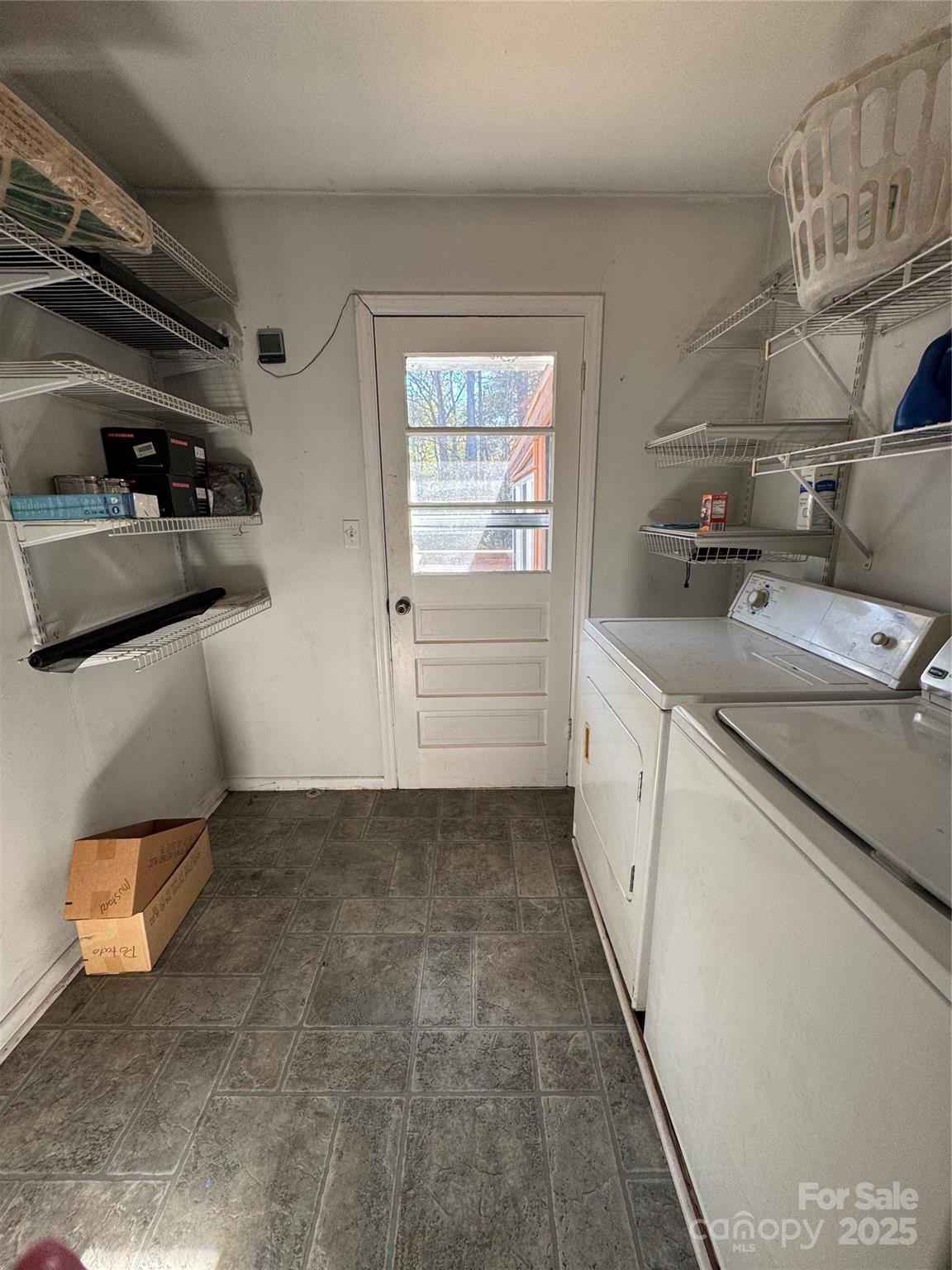 414 Church Street Biscoe, NC 27209 - Photo 14 of 19 a kitchen with a sink and cabinets