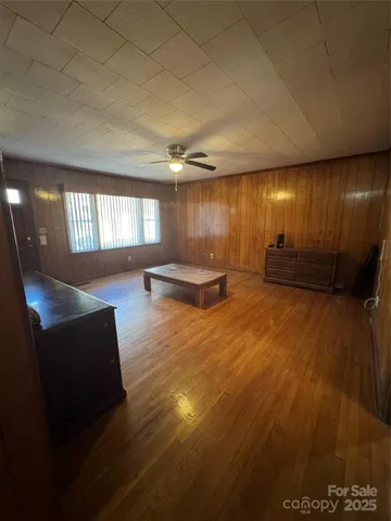 a lobby with furniture and window