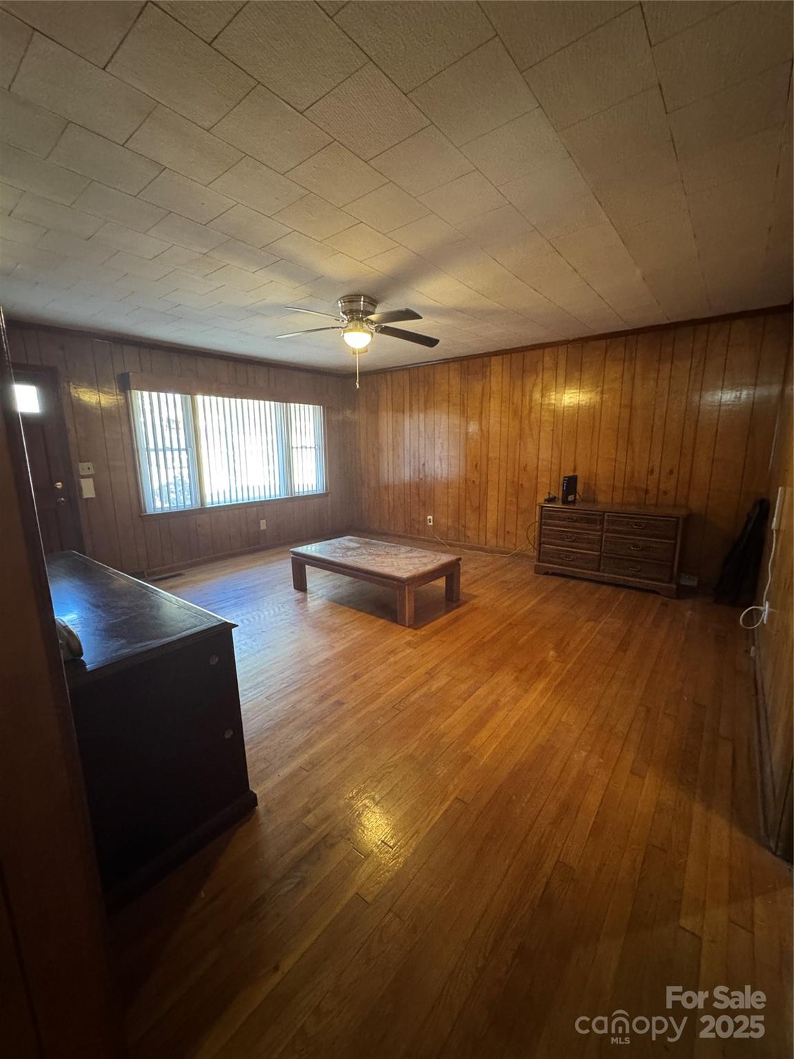 414 Church Street Biscoe, NC 27209 - Photo 2 of 19 a lobby with furniture and window