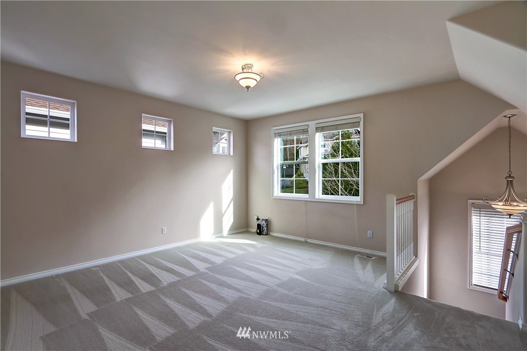 17013 Parkside Way Southeast Renton, WA 98058 - Photo 14 of 26 a view of an empty room with a window