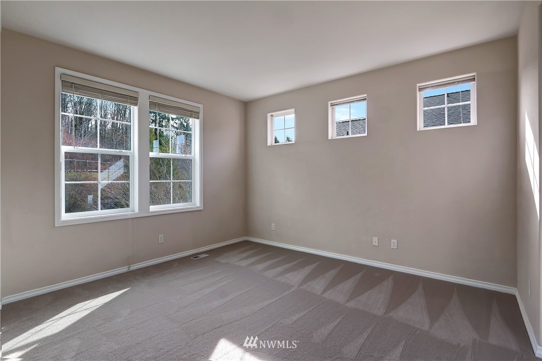 17013 Parkside Way Southeast Renton, WA 98058 - Photo 17 of 26 a view of an empty room with a window