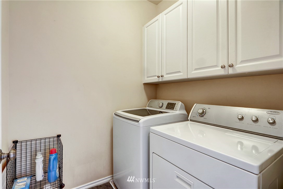 17013 Parkside Way Southeast Renton, WA 98058 - Photo 24 of 26 a utility room with dryer and washer