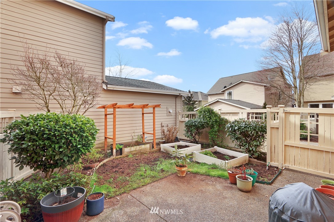 17013 Parkside Way Southeast Renton, WA 98058 - Photo 25 of 26 a garden view with a seating space