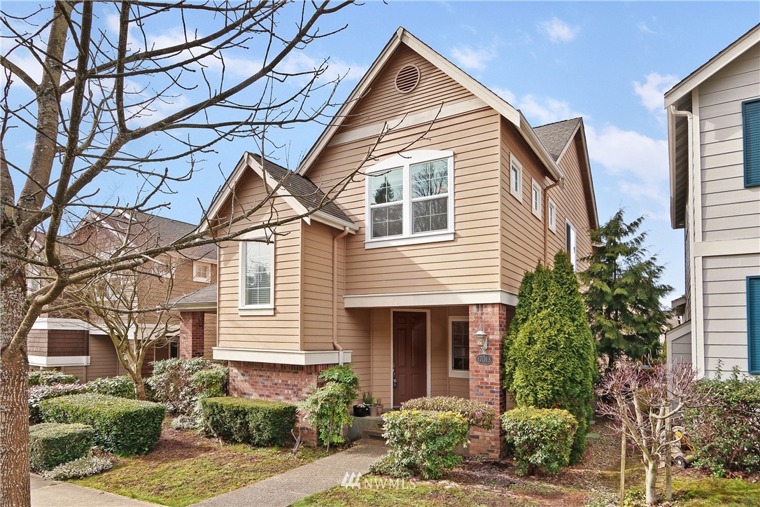 17013 Parkside Way Southeast Renton, WA 98058 - Photo 26 of 26 a view of a house with a yard and potted plants