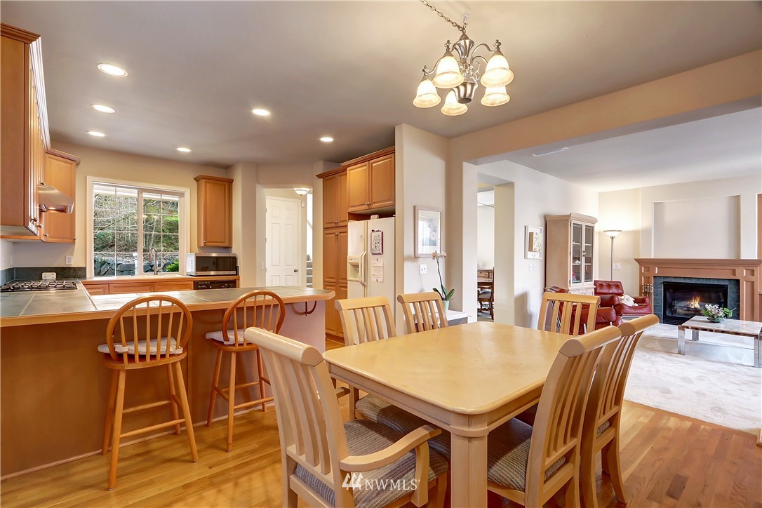 17013 Parkside Way Southeast Renton, WA 98058 - Photo 7 of 26 a view of a dining room with furniture window and outside view