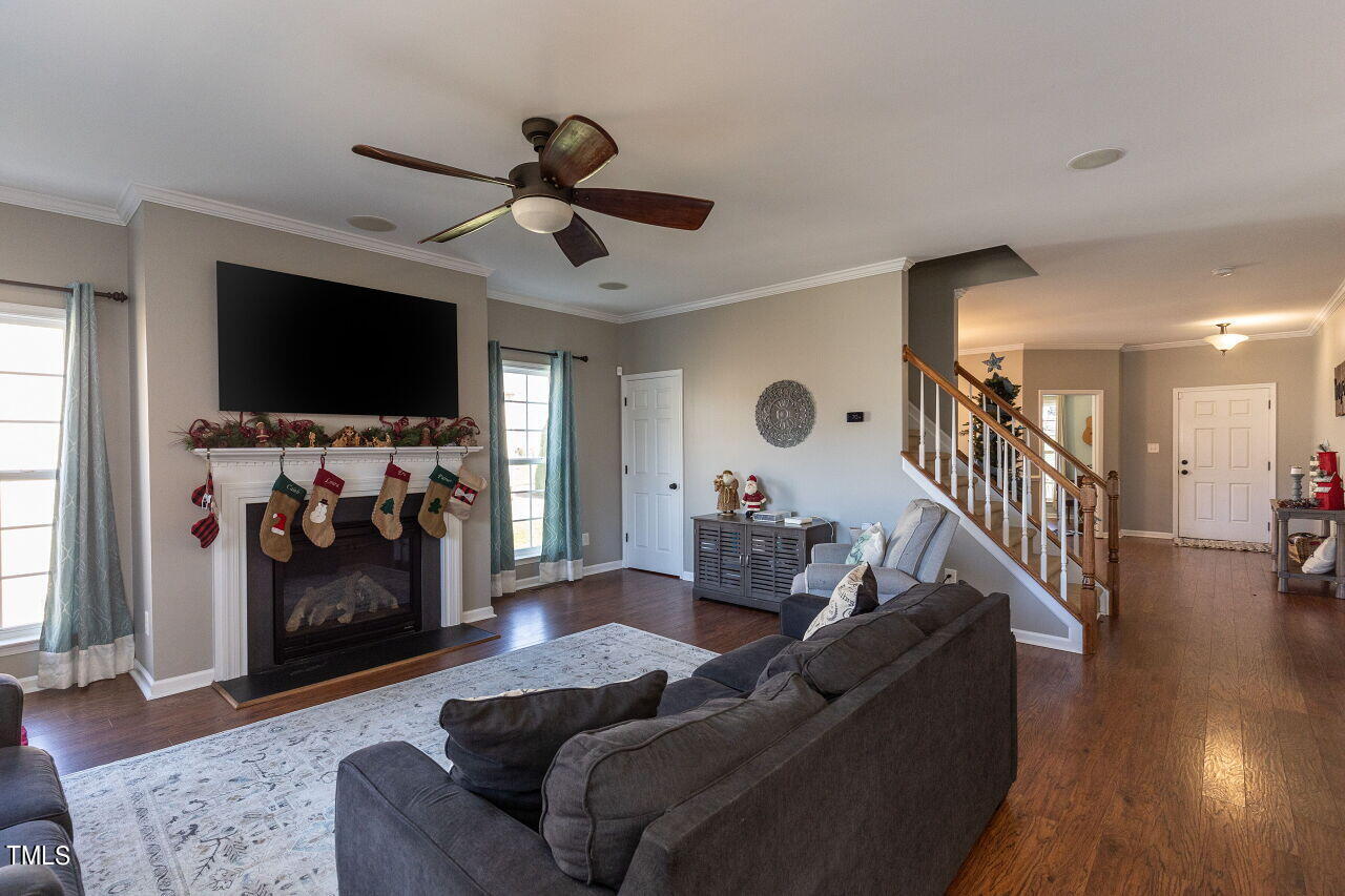 100 Acentala Court Raleigh, NC 27603 - Photo 11 of 41 011-1280x960-family-room-with-fireplace