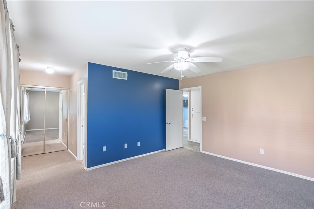 2415 Peppertree Lane Riverside, CA 92506 - Photo 20 of 39 a view of a livingroom with a chandelier fan