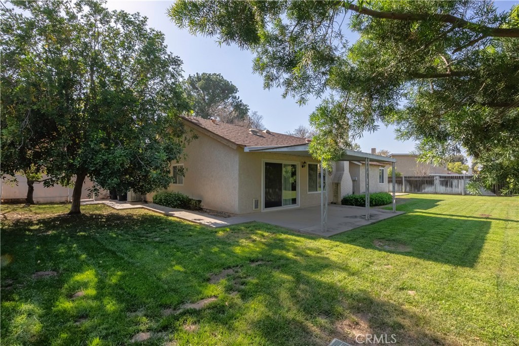 2415 Peppertree Lane Riverside, CA 92506 - Photo 24 of 39 a view of a house with a yard and tree s