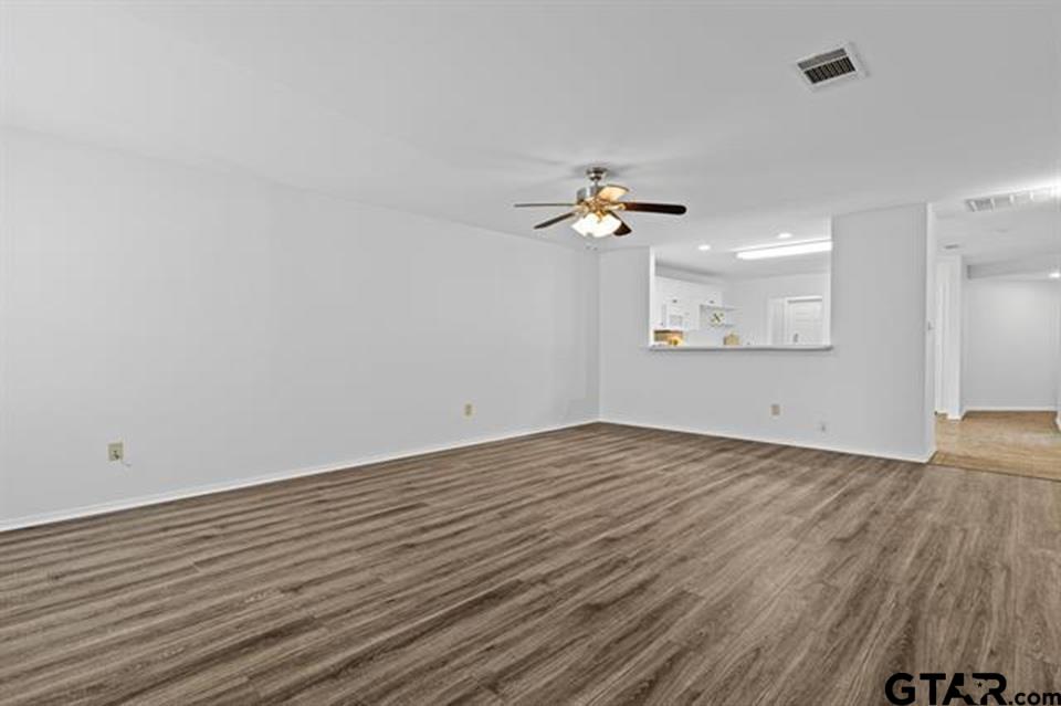 1807 Paverstone Lane Longview, TX 75605 - Photo 21 of 37 wooden floor in an empty room