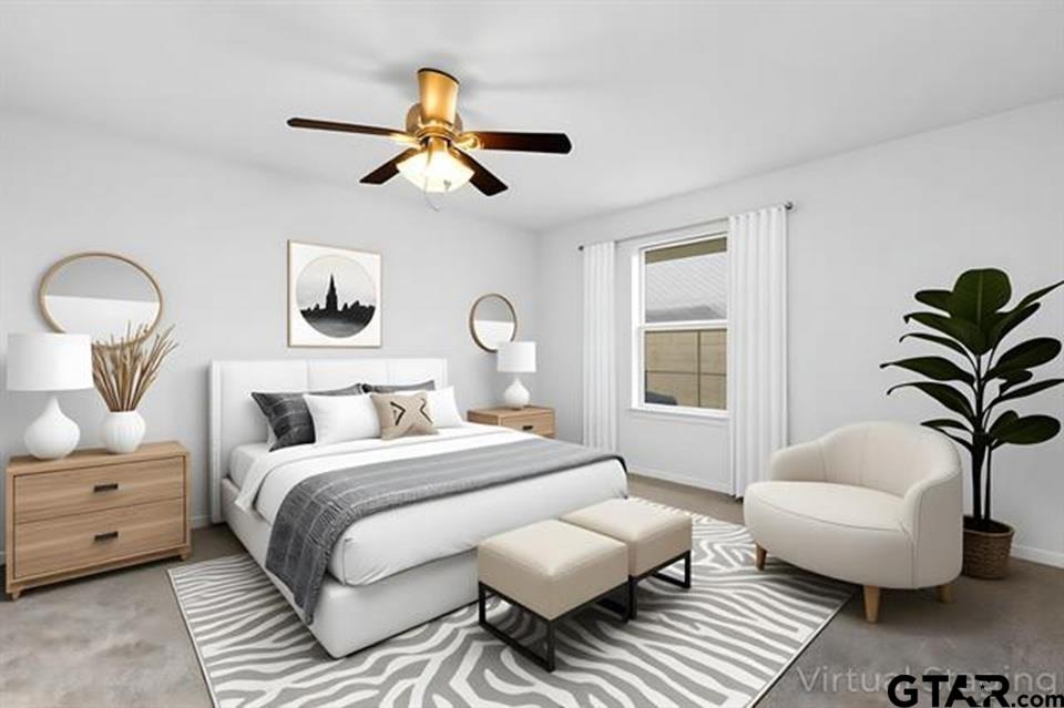 1807 Paverstone Lane Longview, TX 75605 - Photo 22 of 37 a bedroom with a large bed and a window