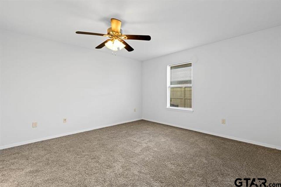 1807 Paverstone Lane Longview, TX 75605 - Photo 23 of 37 an empty room with a window