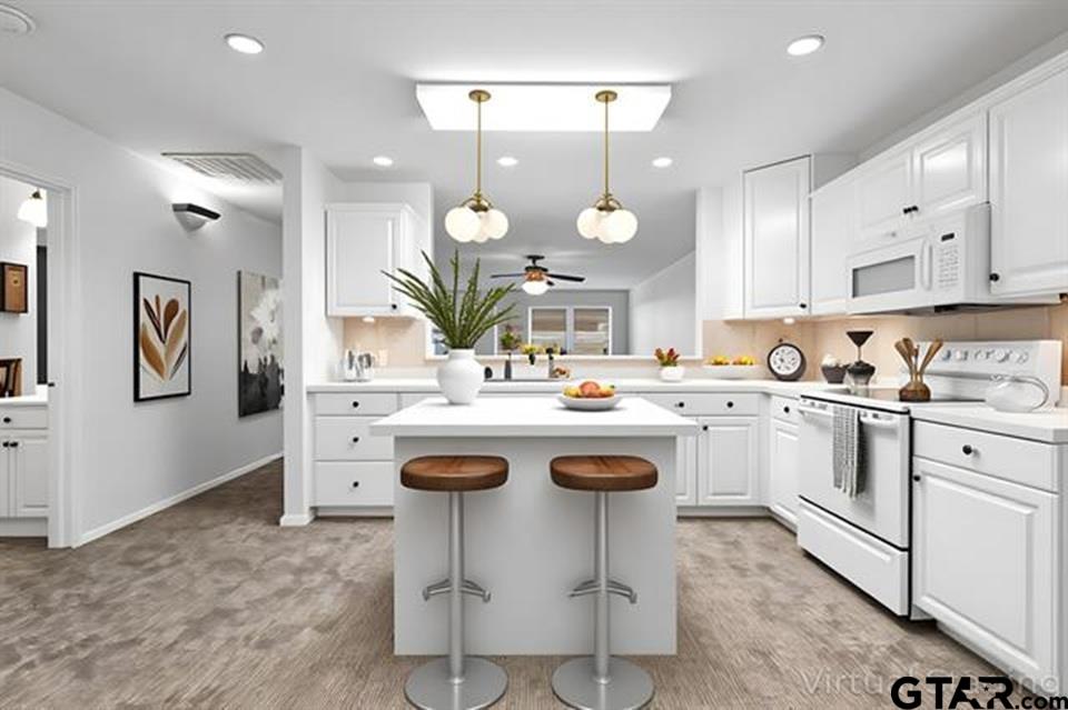 1807 Paverstone Lane Longview, TX 75605 - Photo 6 of 37 a kitchen with a sink and white cabinets