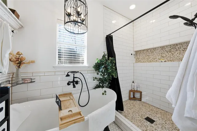 a bathroom with a sink a mirror and a window