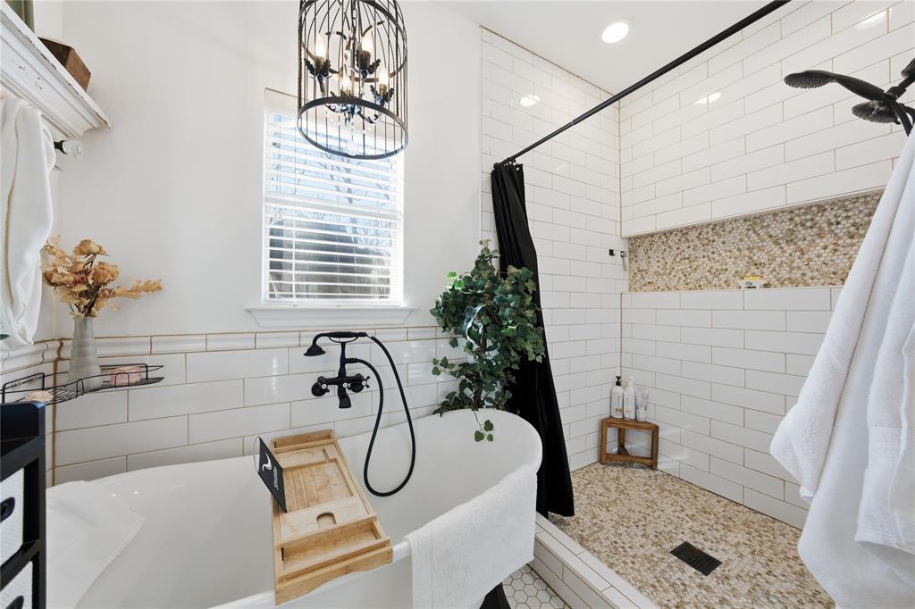 5262 Rio Vista Malakoff, TX 75148 - Photo 14 of 29 a bathroom with a sink a mirror and a window