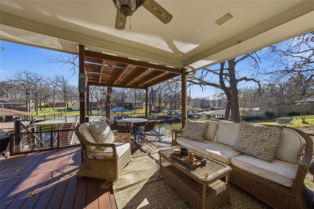 5262 Rio Vista Malakoff, TX 75148 - Photo 21 of 29 a living room with furniture and a floor to ceiling window