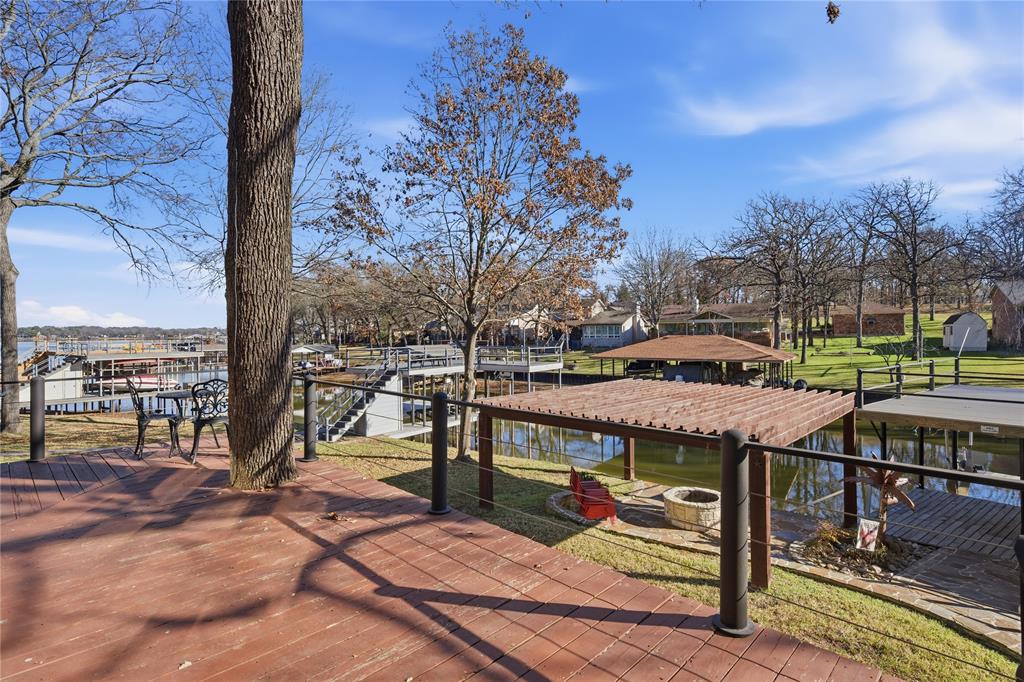 5262 Rio Vista Malakoff, TX 75148 - Photo 23 of 29 a view of a wooden deck with trees