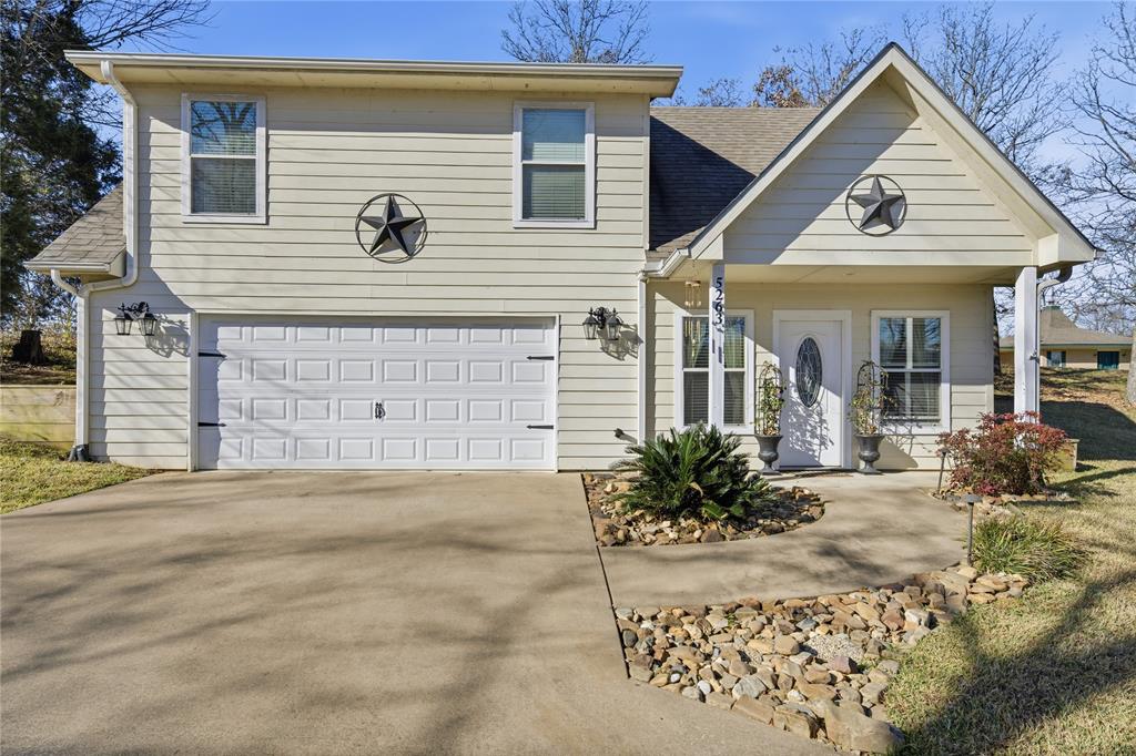 5262 Rio Vista Malakoff, TX 75148 - Photo 5 of 29 a view of a house with a yard and potted plants