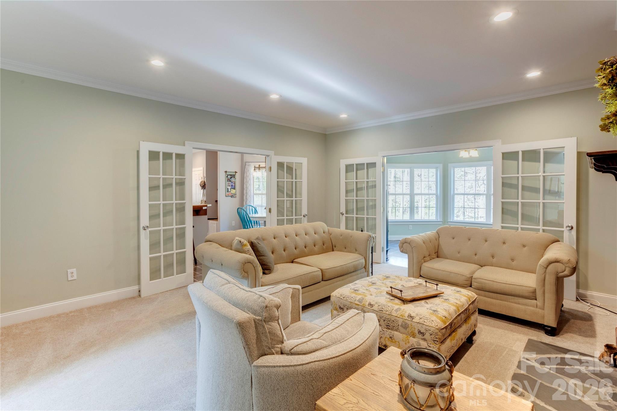 2715 Tabitha Lane Concord, NC 28025 - Photo 19 of 41 a living room with furniture and a large window